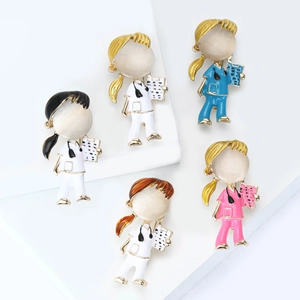 Five assorted medical nurse brooches with cat eye stones and colorful enamel finish