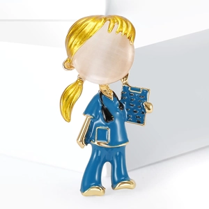Detailed close-up of a nurse brooch featuring pink cat-eye stone and blue enamel finish