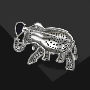 Detailed back view of elephant brooch showing silver alloy hollow paving and pin clasp