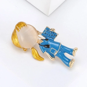 Detailed close-up of a blue enamel nurse brooch featuring a large cat-eye stone