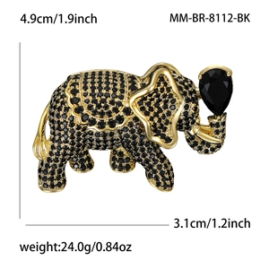Golden elephant brooch with black rhinestones and gemstone, size 4.9cm by 3.1cm