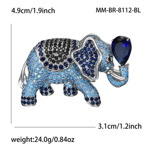 Elegant elephant brooch with blue crystals and pear-shaped stone for coats