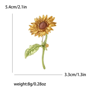 Minimalistische zonnebloem broche in geel emaille en groen met afmetingen erbij