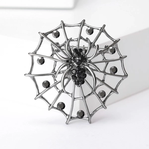 Broche toile d'araignée gothique avec cristaux noirs et finition métal noir pour femme