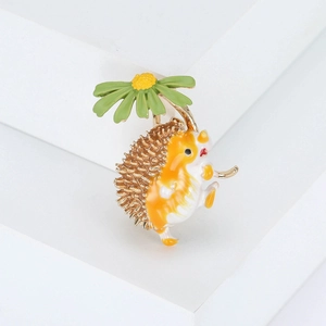 Cute enamel hedgehog brooch with daisy umbrella and polished gold alloy finish