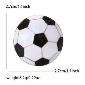 Classic black and white football enamel brooch with gold alloy rim, 2.7cm diameter