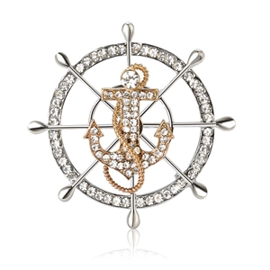 Nautical ship wheel and anchor brooch with sparkling crystals in silver and gold tones