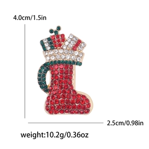 Sparkling Christmas boot brooch with red rhinestones and gold alloy metal base
