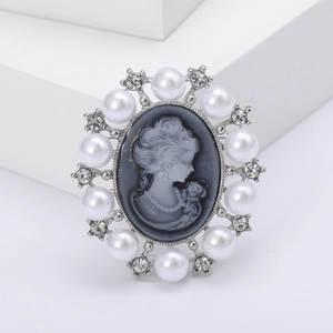 Vintage Victorian style cameo brooch with white pearls and sparkling rhinestones