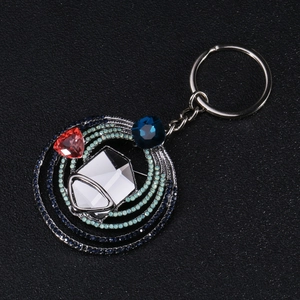 Detailed macro view of high-end vintage crystal glass brooch with multi-color rhinestones