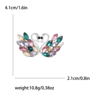 Detailed size view of swan brooch featuring colorful crystals and 4.1cm width dimensions