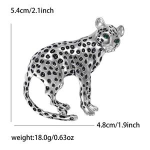 Detail view of leopard brooch with size dimensions 5.4x4.8cm and enamel finish