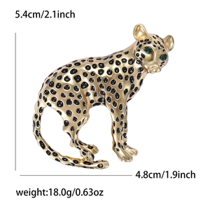 Detail view of enamel leopard brooch dimensions 5.4cm by 4.8cm and 18.0g weight