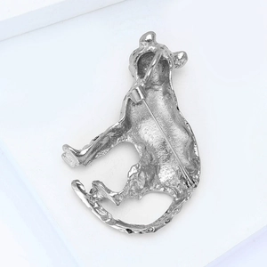 Detail view of the silver leopard brooch back featuring the safety pin and secure clasp