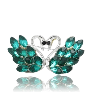 Elegant twin swan brooch with green marquise crystals and heart-shaped silver alloy design