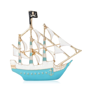 Golden pirate ship brooch with light blue and white enamel details and skull flag on white back
