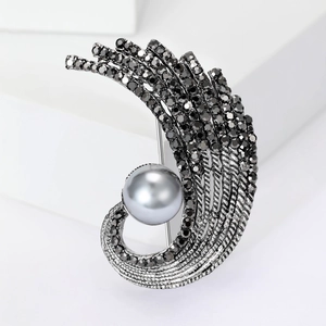 Vintage feather brooch with dark grey rhinestones and a grey pearl in gunmetal finish