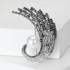 Elegant vintage silver wing brooch with black rhinestones and large white pearl accent
