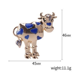 Enameled ox brooch with blue heart design, size 46x45mm, gold-plated fashion accessory