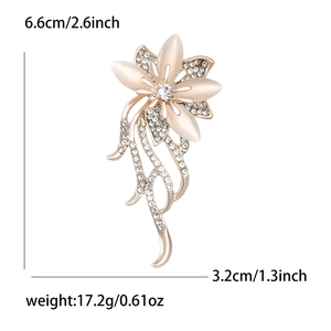 Elegant gold flower brooch with cat eye stone and rhinestones, size 6.6cm by 3.2cm