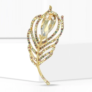 Elegant gold feather brooch with iridescent rhinestones and champagne teardrop crystal