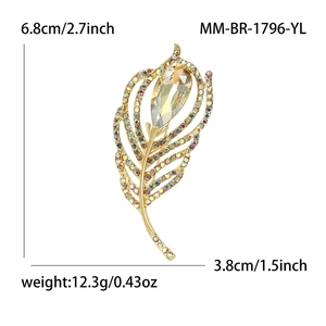 Elegant gold feather brooch with colorful rhinestones and yellow teardrop gem, 6.8x3.8cm