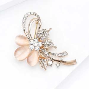 Élégante broche fleur en pierre œil de chat avec finition or 18 carats et cristaux