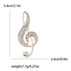 Elegant gold musical note brooch with sparkling rhinestones and crystal accents