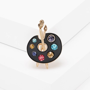 Artistic painter palette brooch with colorful crystals and golden paint brushes