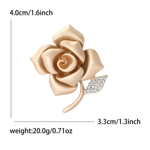 Elegant matte gold rose brooch with sparkling crystals and size dimensions marked