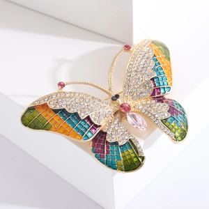 Exquisite colorful butterfly brooch with enamel and crystals on a geometric stand