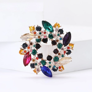Élégante broche couronne florale en cristal avec strass colorés sur base en alliage