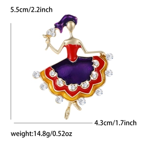 Detail of ballet dancer brooch with colorful enamel layers and sparkling rhinestones