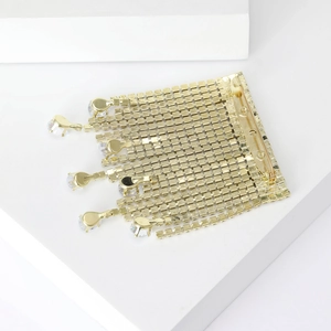 Broche à franges dorées tendance avec strass brillants et pendentifs en cristal