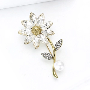 Elegant rhinestone daisy flower brooch with gold petals and a white pearl accent for suits