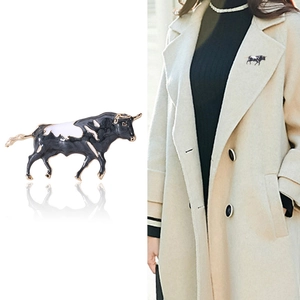 Chic black and white enamel bull brooch with gold-plated alloy finish for winter coats
