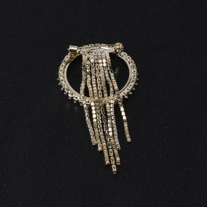 Broche ronde dorée élégante avec de longues chaînes à franges et strass pour femmes