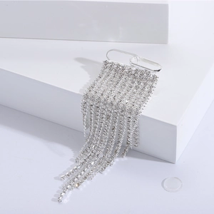 Silver tassel brooch with luxury rhinestones for suit accessories on a white platform