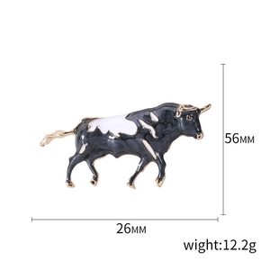 Ox shape alloy brooch with black and white enamel finish, size 56mm x 26mm, 12.2g