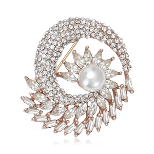 Exquisite flower brooch featuring a large center pearl surrounded by sparkling crystals
