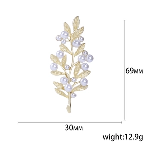 Elegant gold leaf brooch with white pearls, 69mm x 30mm fashion accessory for suits