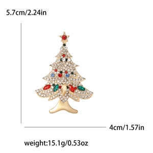 Elegant Christmas tree brooch with colorful rhinestones on a golden alloy metal base