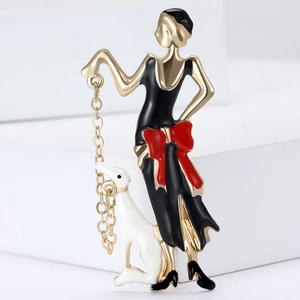 Elegant gold alloy brooch featuring an enamel lady walking a dog with red bow details