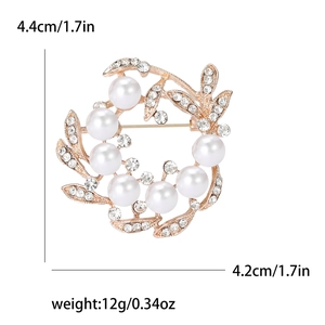 Rose gold wreath brooch with white pearls and sparkling rhinestones, size 4.4 x 4.2 cm