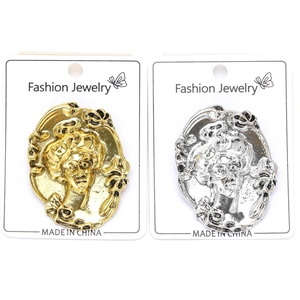 Detailed close-up of retro baroque relief portrait brooches in gold and silver finish
