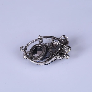 Vintage silver-toned tulip brooch with colorful rhinestones and secure safety pin back