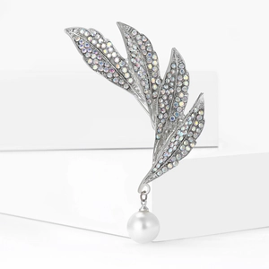 Elegant silver feather brooch with iridescent rhinestones and white pearl pendant