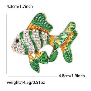 Détail de la broche poisson avec dimensions en cm/pouces et poids en grammes et onces