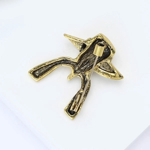 Vintage gold brooch pin for women featuring a retro lady in hat design with secure clasp