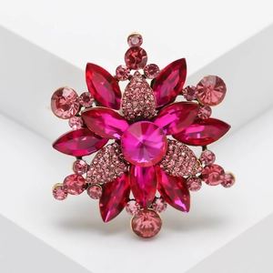Exquisite flower brooch featuring vibrant pink crystals and rhinestones on alloy base